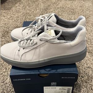 Brand new, the store price is $160. They are light gray.